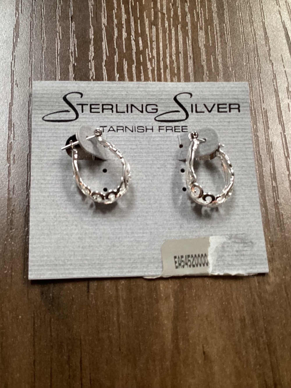 sterling silver hoop earrings with a filigree design New
